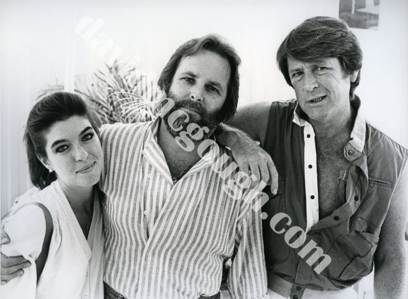 Beach Boys, Brian and Carl Wilson and Gina Martin 1985.jpg